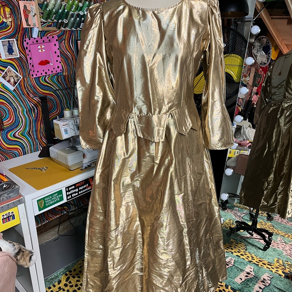 Samantha Pleet gold lame dress with open back and cool waist tabs